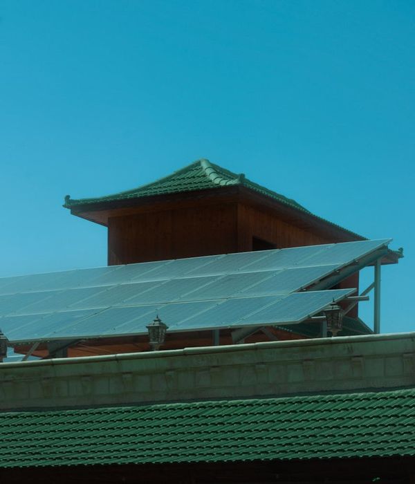 Energy-efficient residential building featuring innovative insulation and renewable energy integration